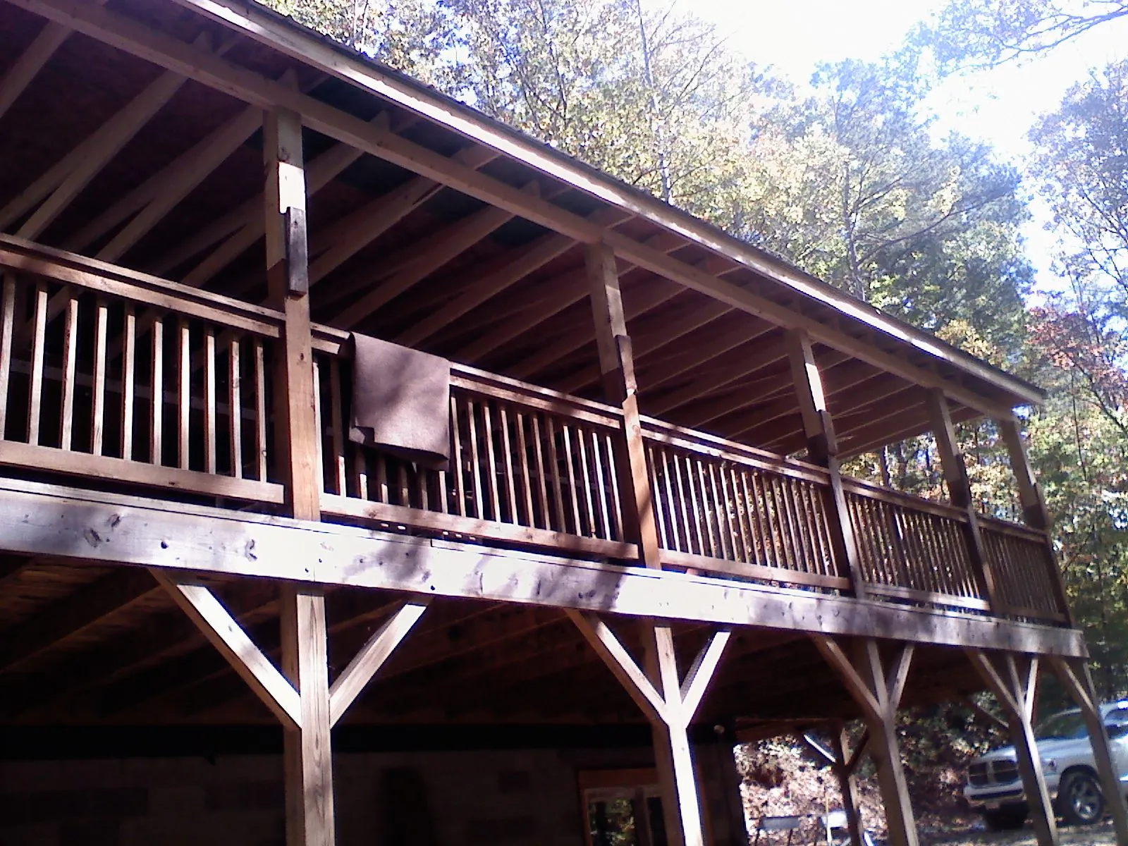 Timber framing under a new elevated porch and deck — Roof Leak Repair in Buies Creek by Roofing Brothers